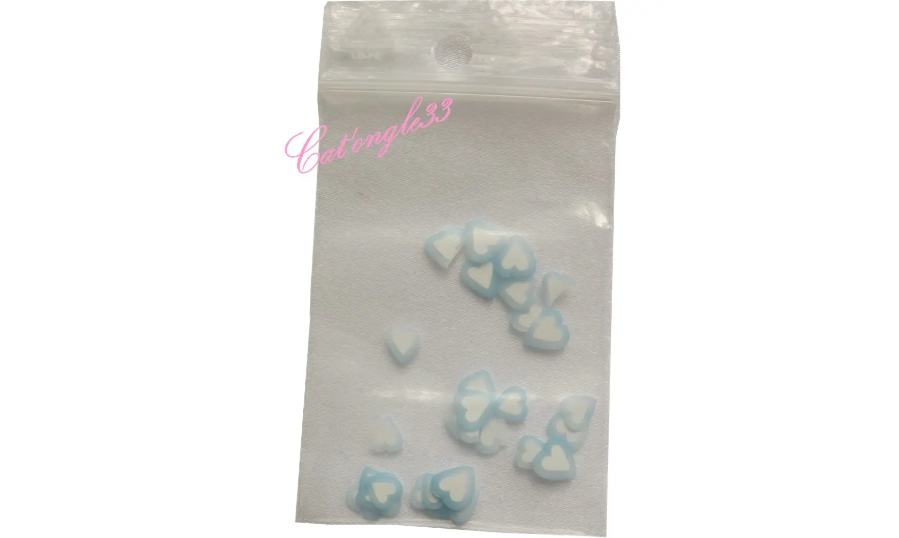 Sachet de fimo coeur bleu clair blanc