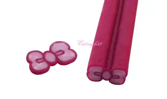 Baton fimo noeud fuchsia