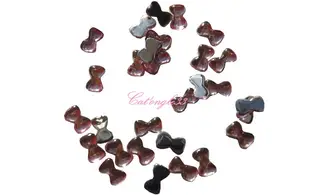 Strass noeud rose clair