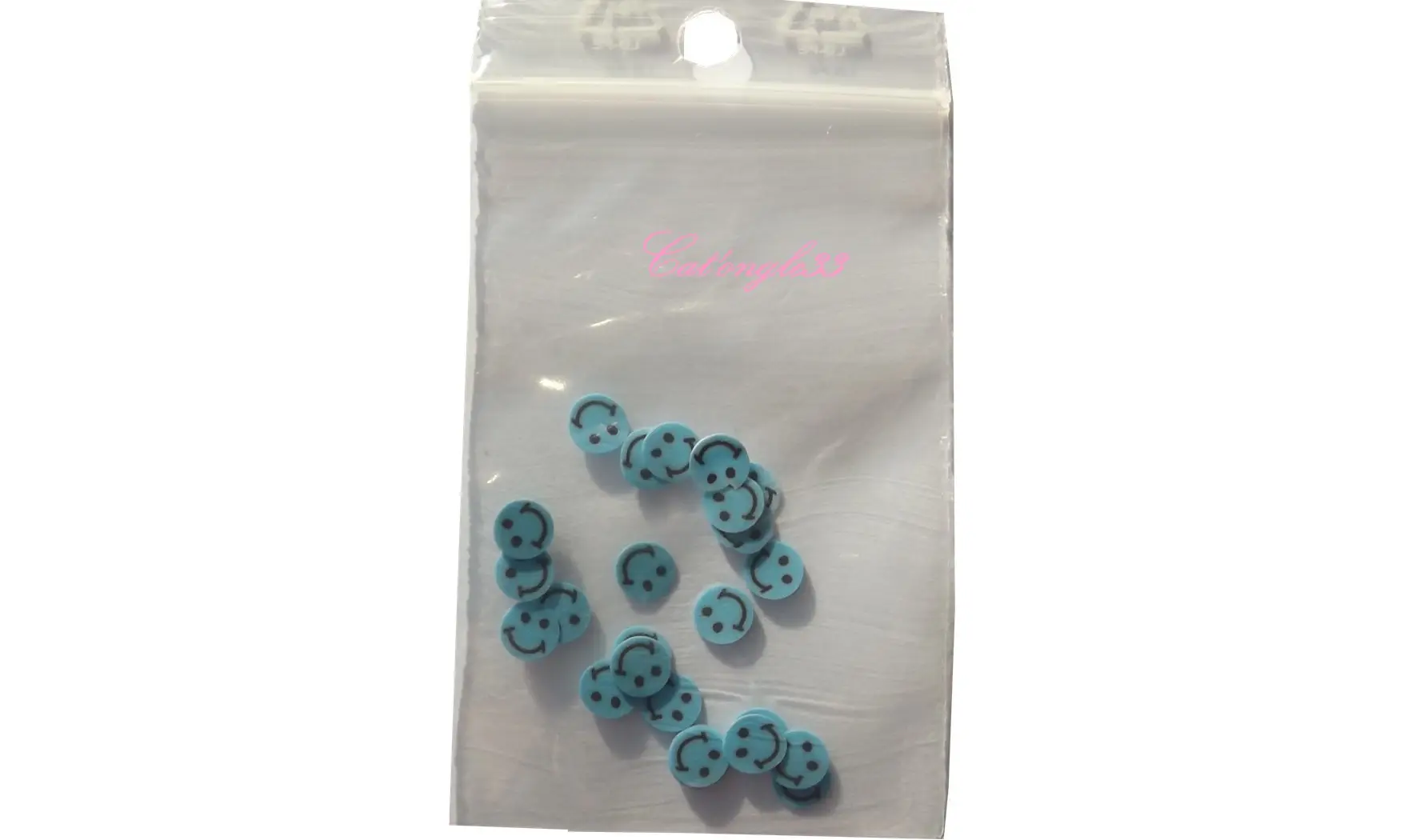 Sachet de fimo smiley bleu