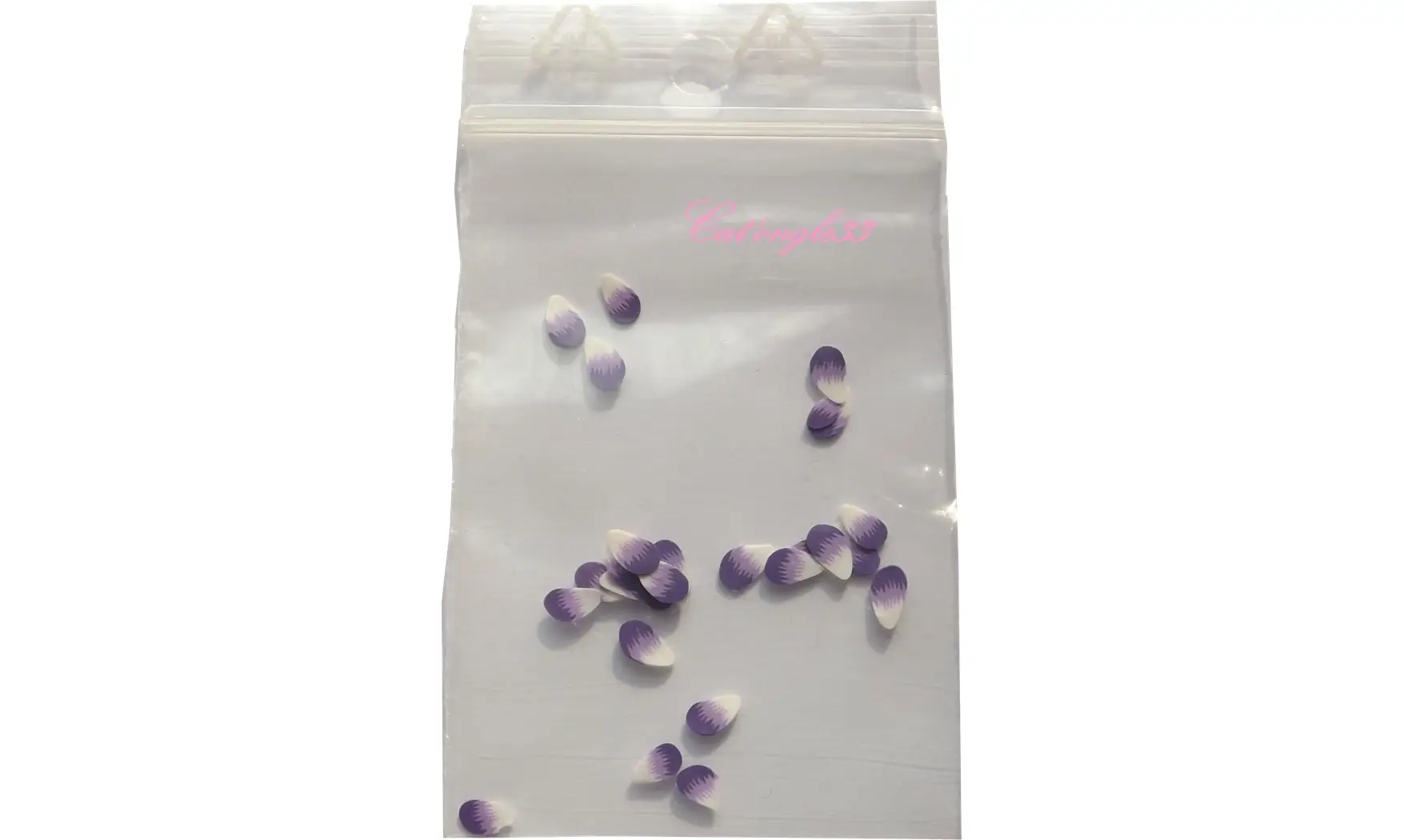 Sachet de fimo plume violette