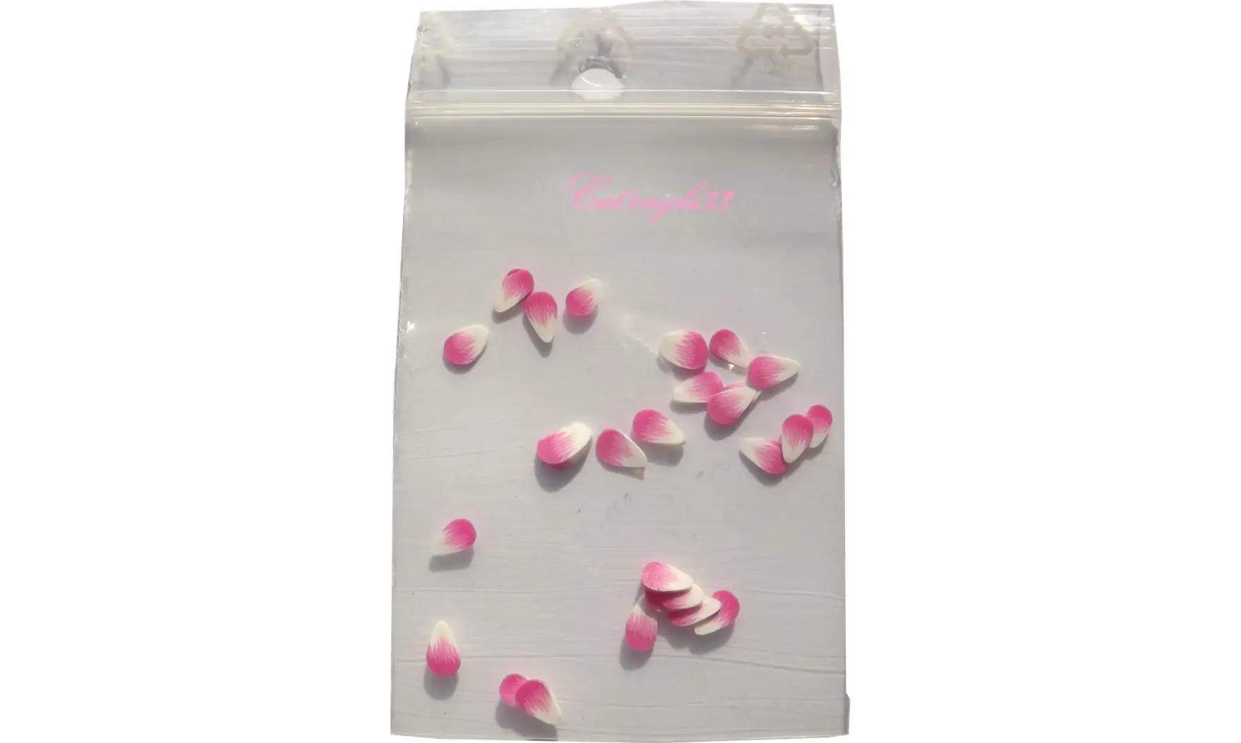 Sachet de fimo plume rose