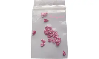 Sachet de fimo plume rose blanche