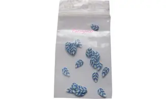 Sachet de fimo plume bleu blanche