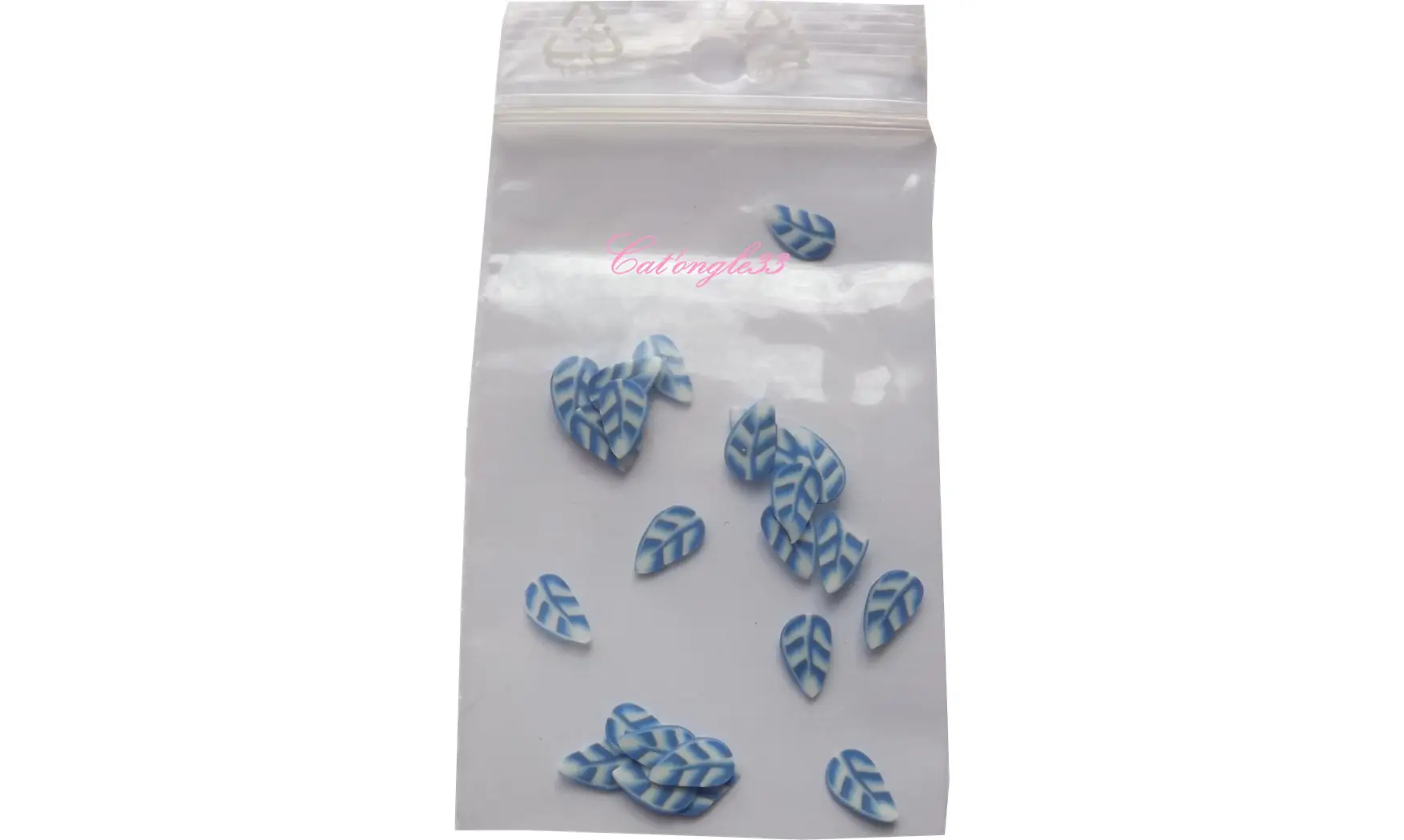 Sachet de fimo plume bleu blanche