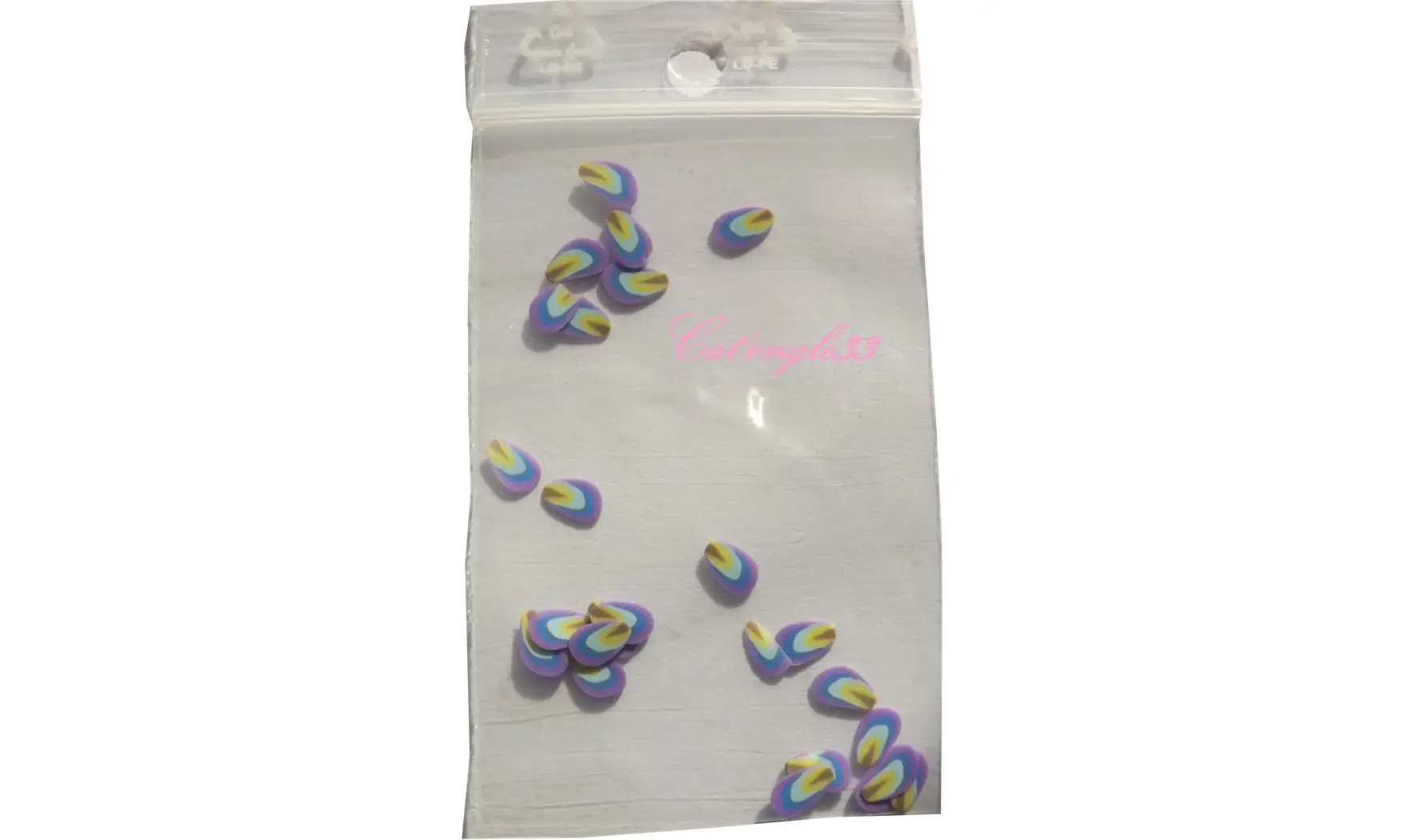 Sachet de fimo plume violette multicoule