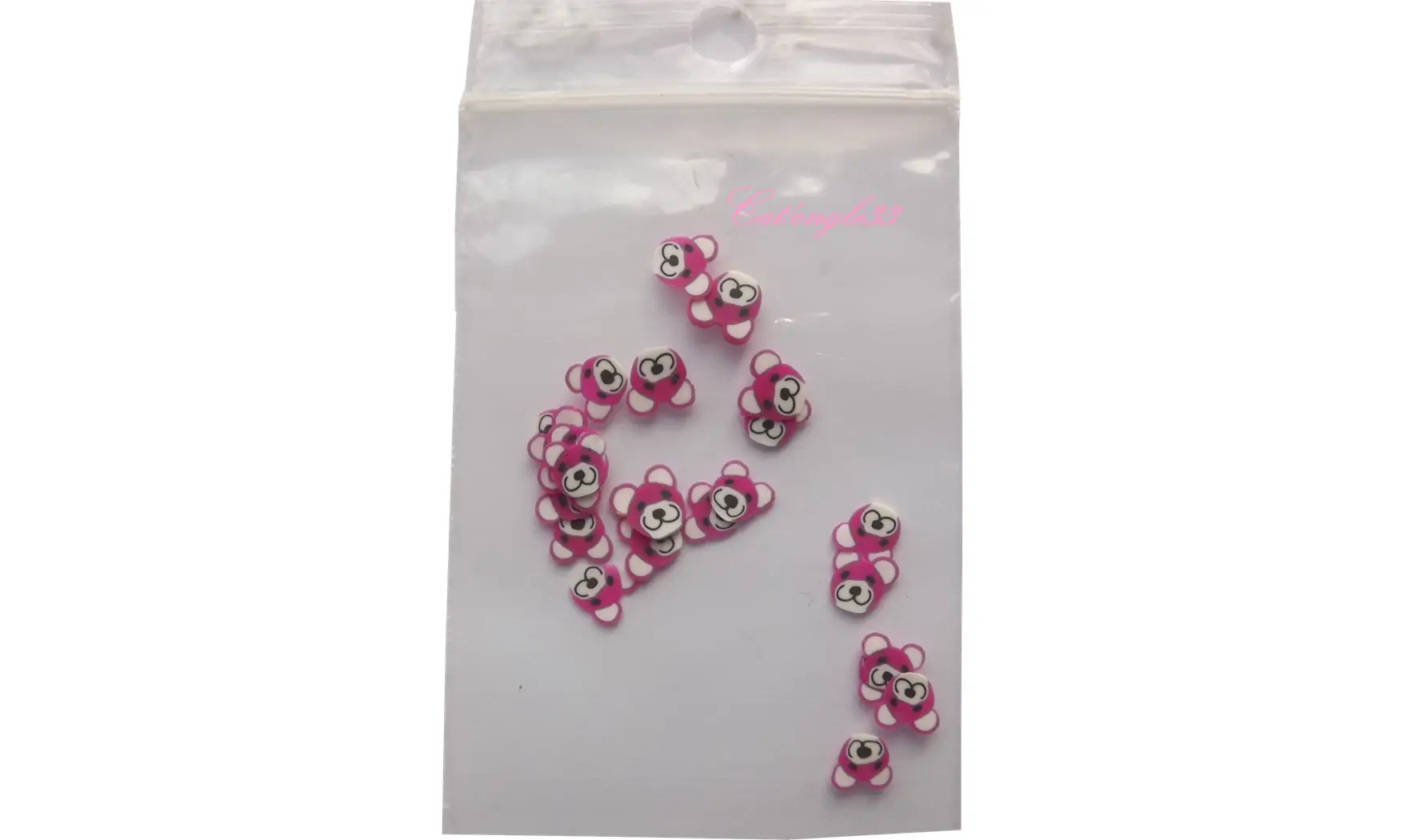 Sachet de fimo ourson fuchsia