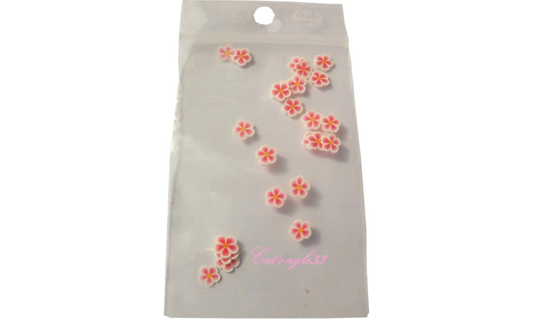 Sachet de fimo fleurs blanche rose
