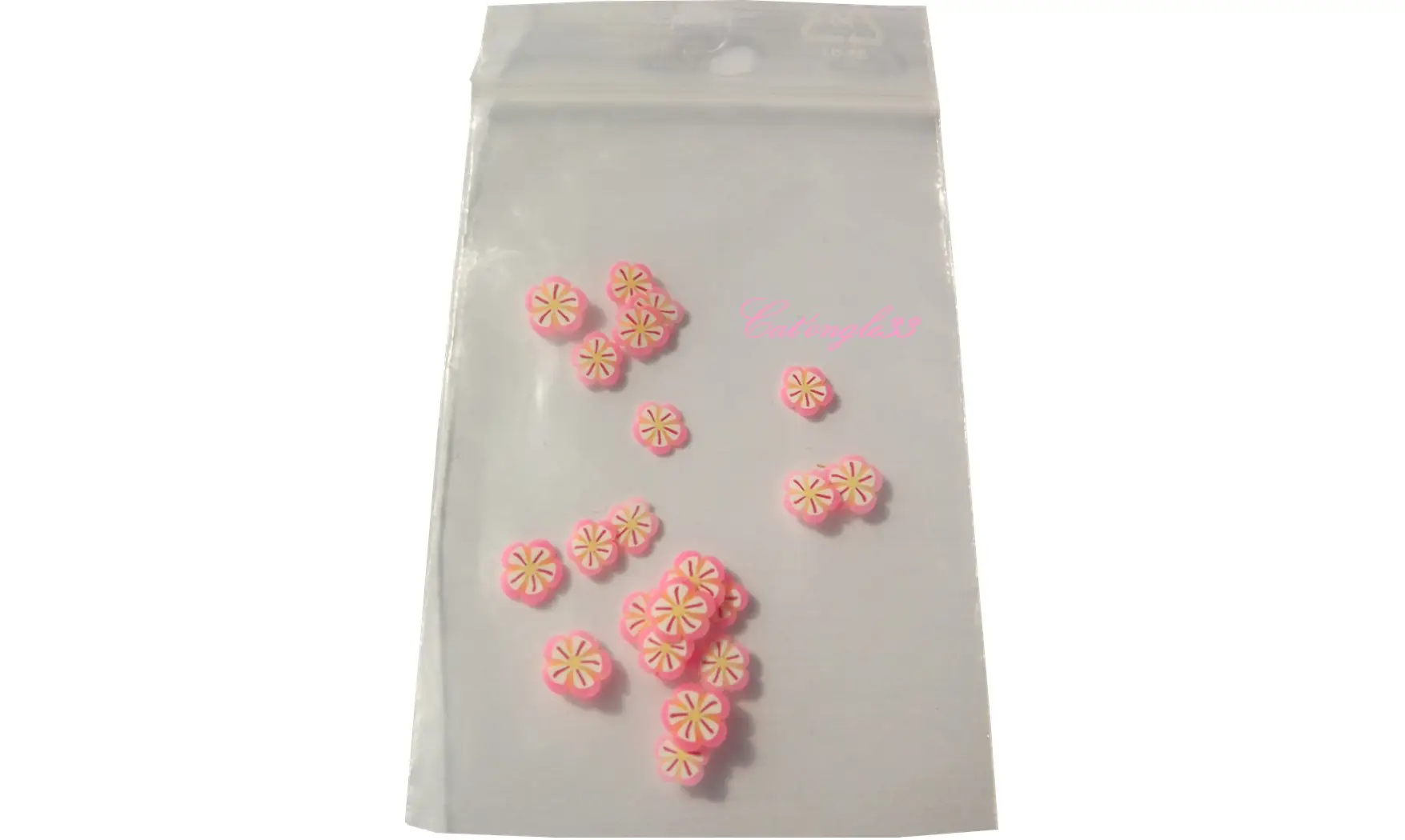 Sachet de fimo fleur rose blanche 1 trai