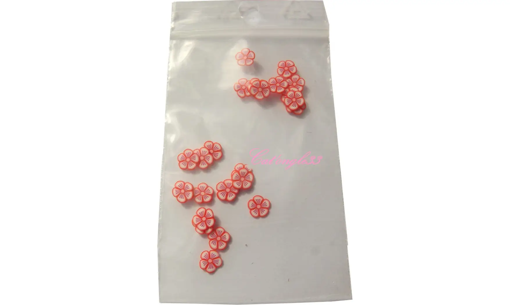 Sachet de fimo fleur rouge pétale 3 trai