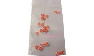Sachet de fimo papillon blanc, rouge