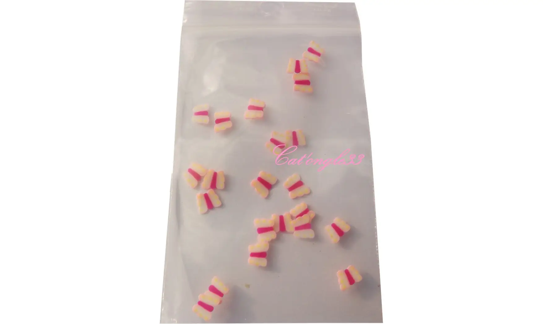 Sachet de fimo papillon blanc point jaun