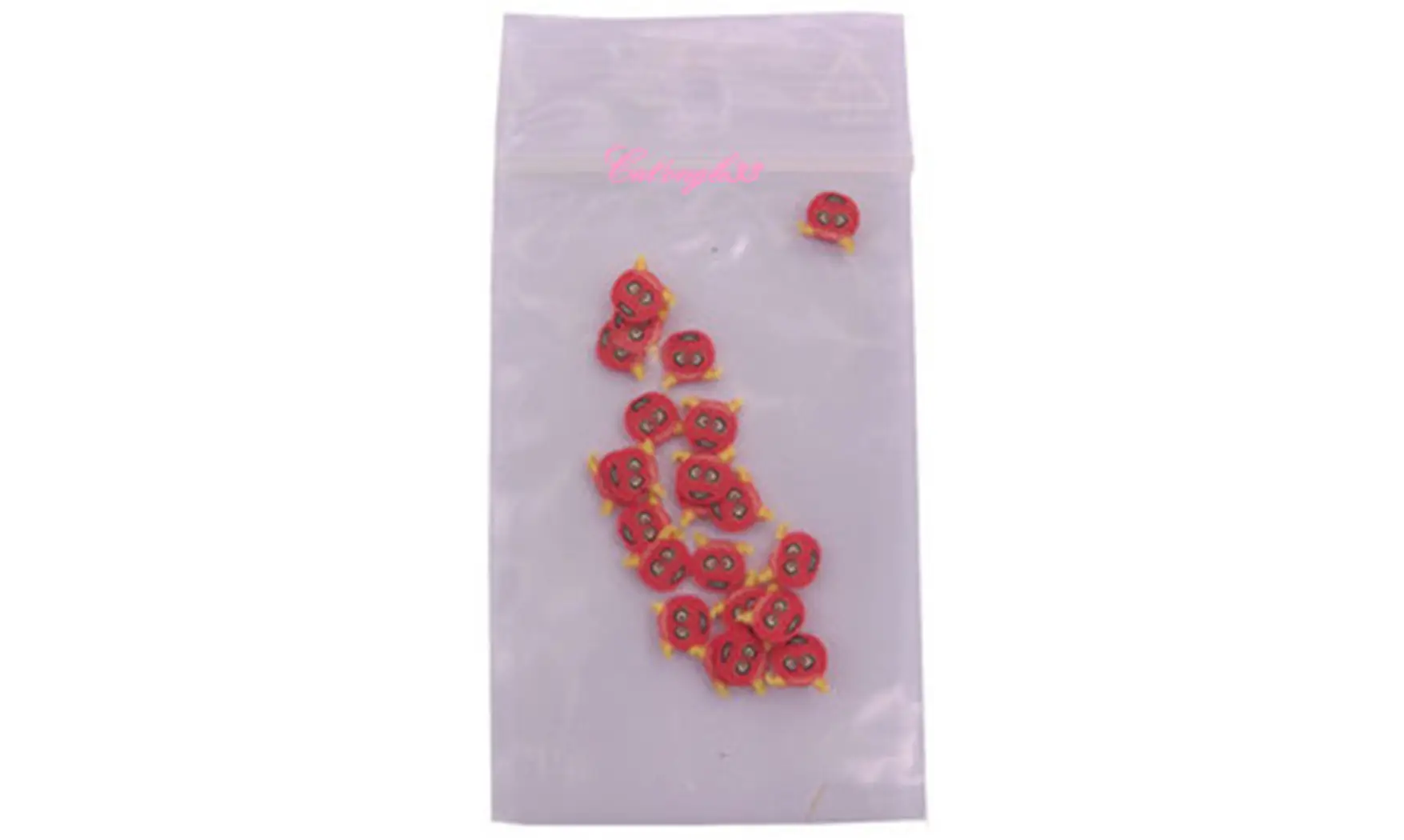 Sachet de fimo ongle monstre rouge