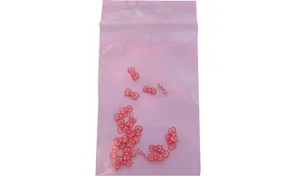 Sachet de fimo noeud rouge