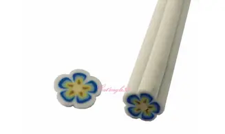 Baton fimo fleur blanche bleu jaune