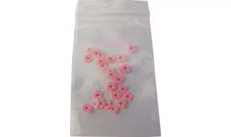 Sachet de fimo fleur rose blanche