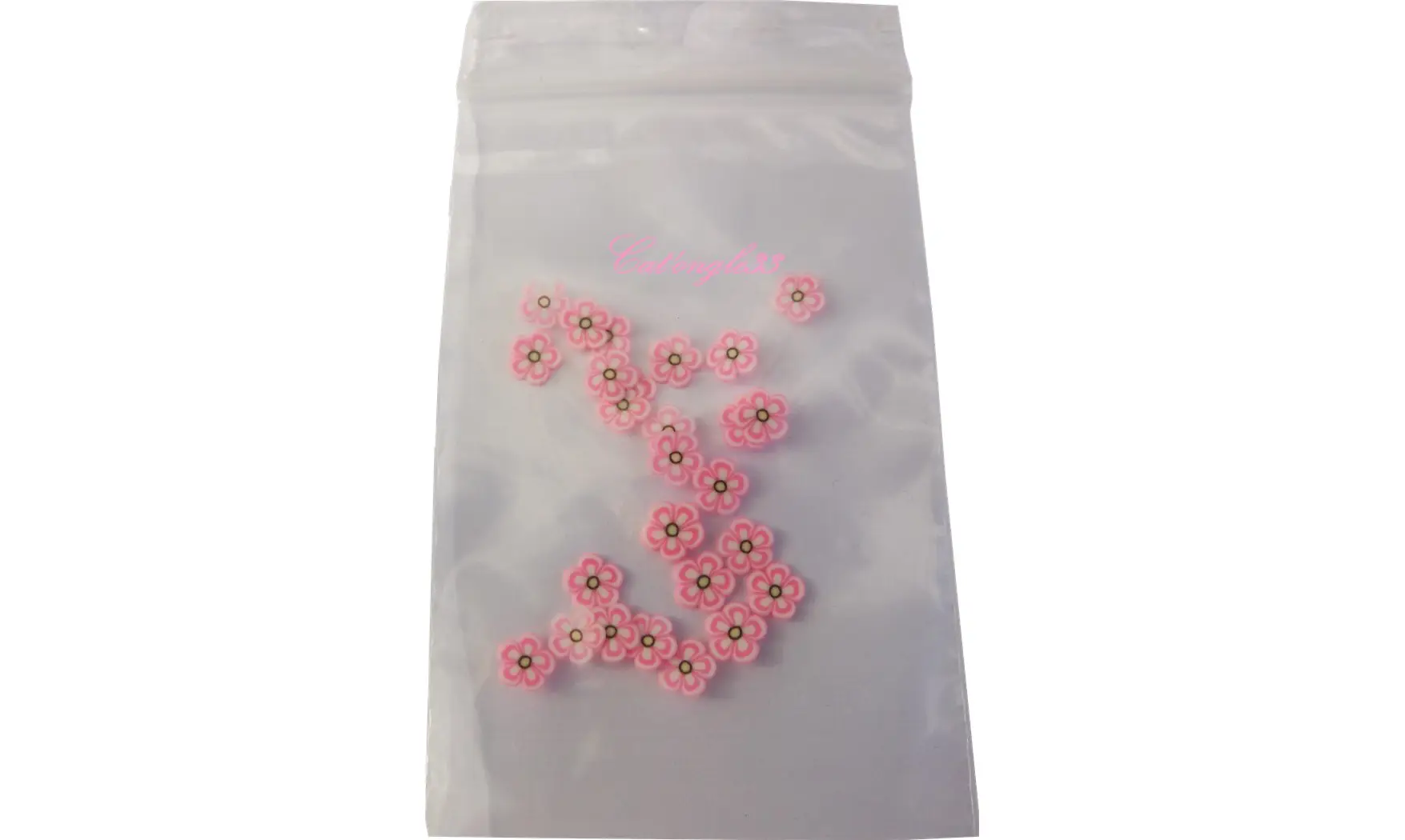 Sachet de fimo fleur rose blanche