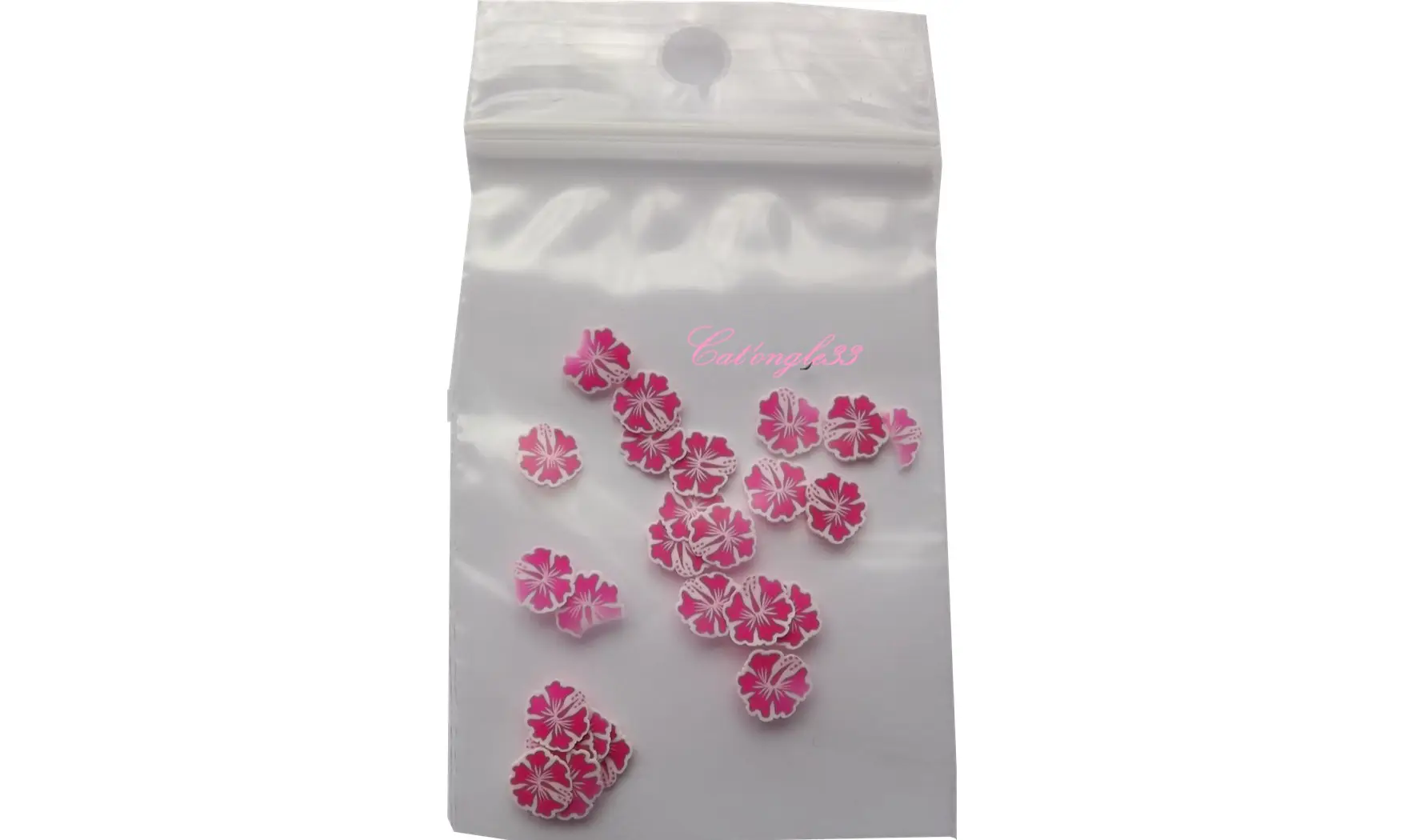 Sachet de fimo hibiscus fuchsia