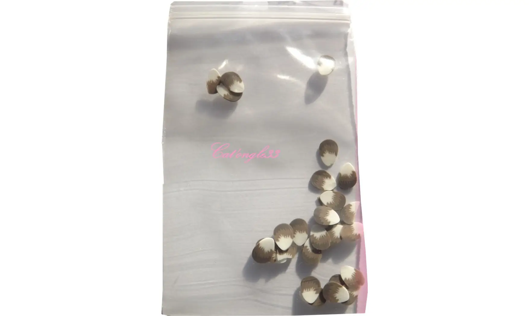Sachet de fimo plume marron