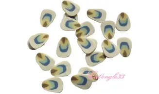 Sachet de fimo plume blanche multicoul.