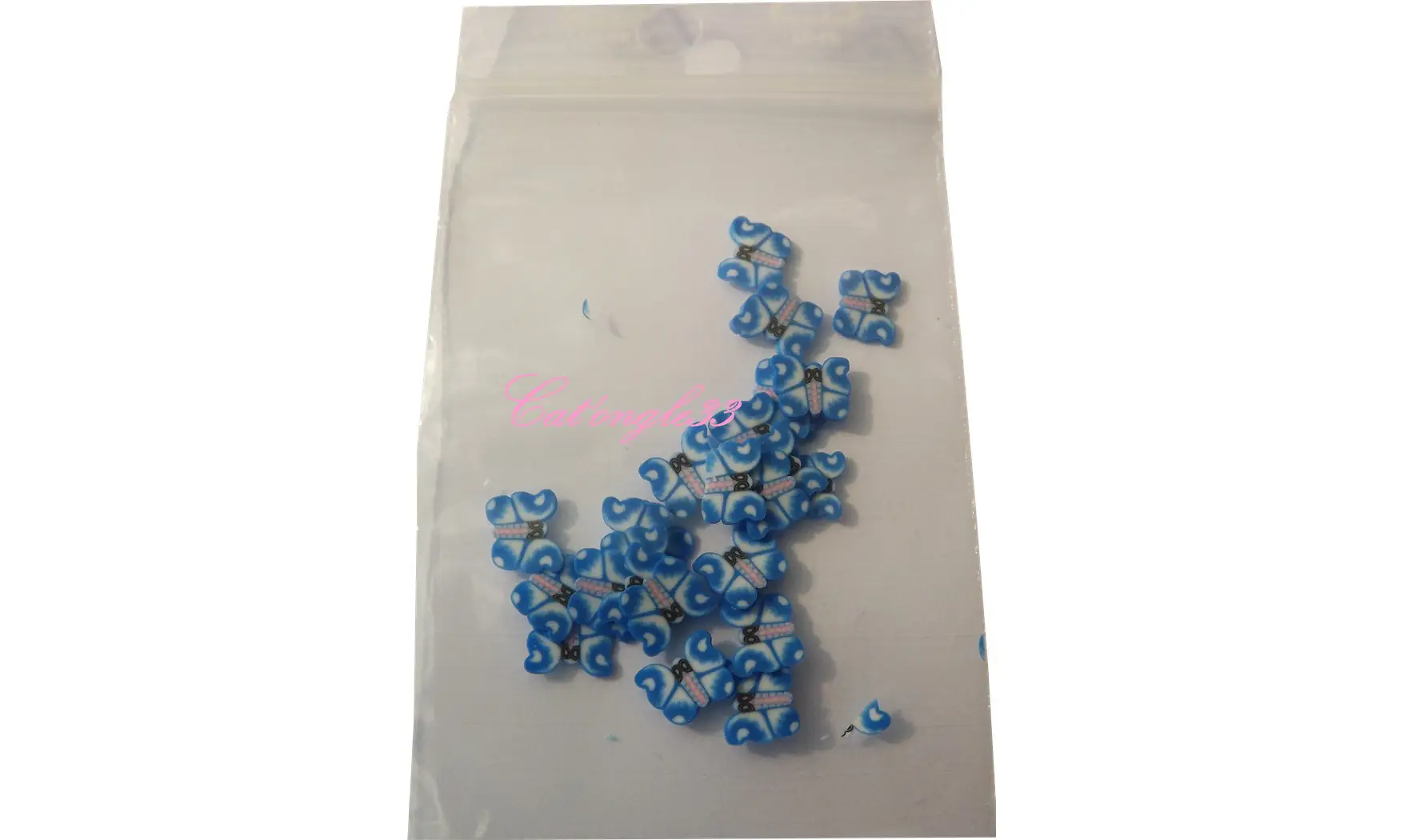 Sachet de fimo papillon bleu