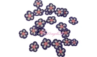 Sachet de fimo fleur violette blanche