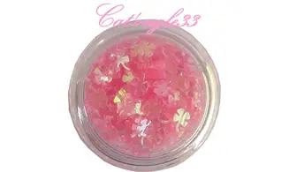 Hologramme trèfle rose transparent